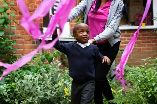 Beyond Autism child playing outside