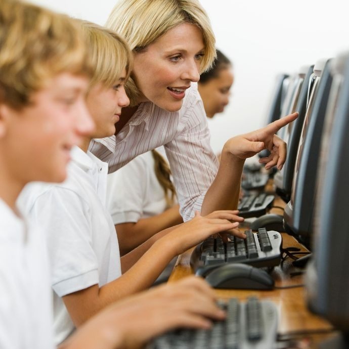 Children learning media studies in school